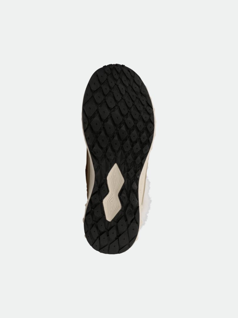 The Halti Skene DX Winterboot Women's features a black diamond-patterned sole and beige midsection shown from the bottom.