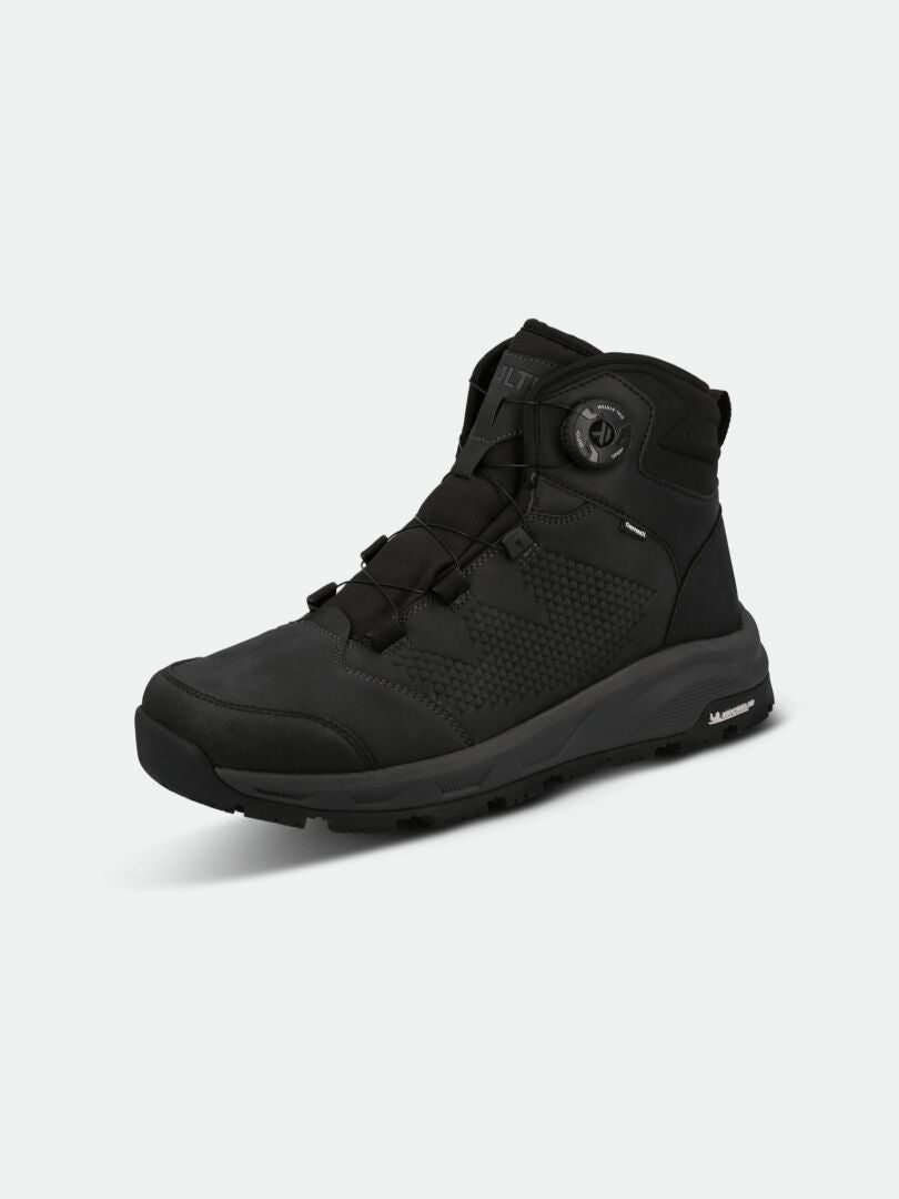The Halti Buli Mid 2 DX Freelock Friction Shoe is a black waterproof winter shoe with ankle support and Michelin sole.