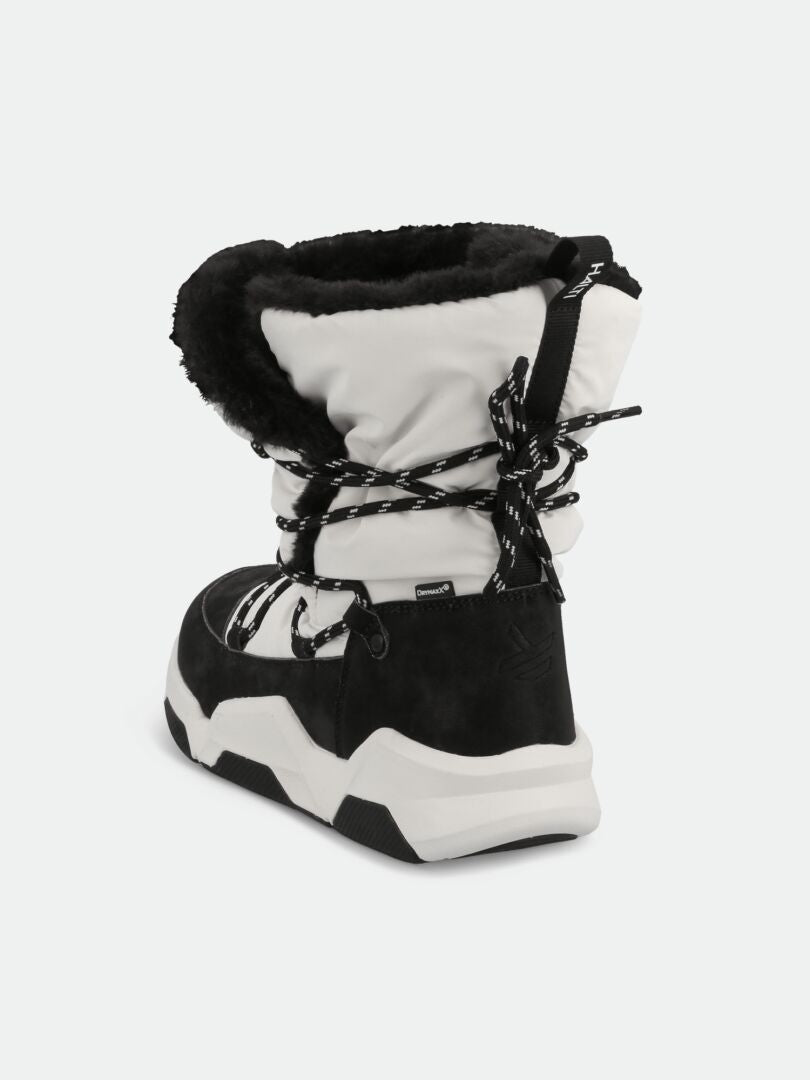 The Halti Jeti DX Winterboot Women's features black and white colors, thick sole, faux fur lining, and patterned laces.