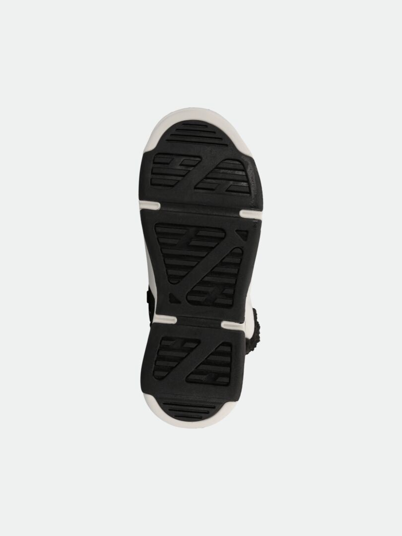 The image shows the geometric rubber sole of Halti Jeti DX Winterboot Women's, viewed from the bottom.