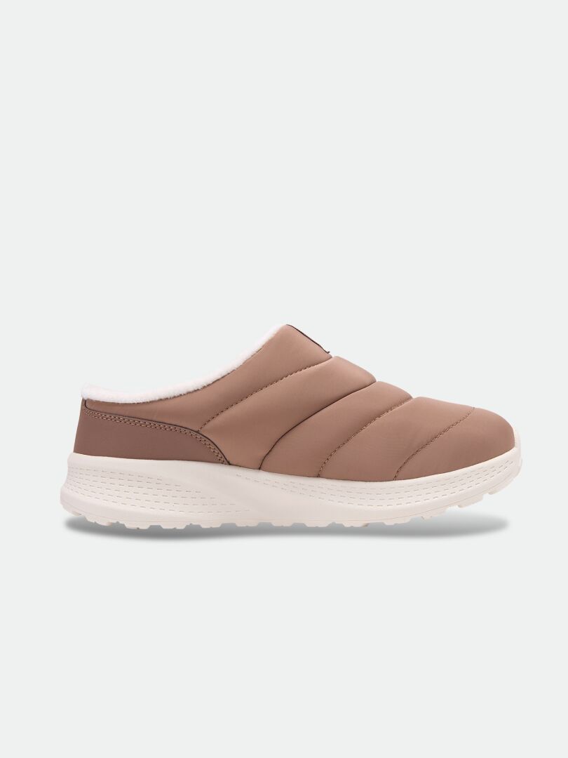 The Halti Rest 2 Slipper: tan, slip-on with quilted stitching, white EVA sole, and light fleece lining in side view.