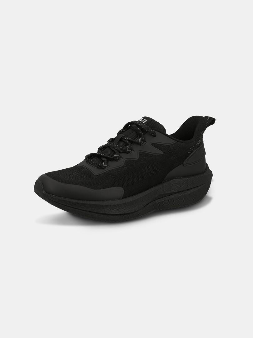 Halti Syke Sneaker Men's: black, lightweight with BoomaxX ETPU foam, mesh upper, thick sole on white background.