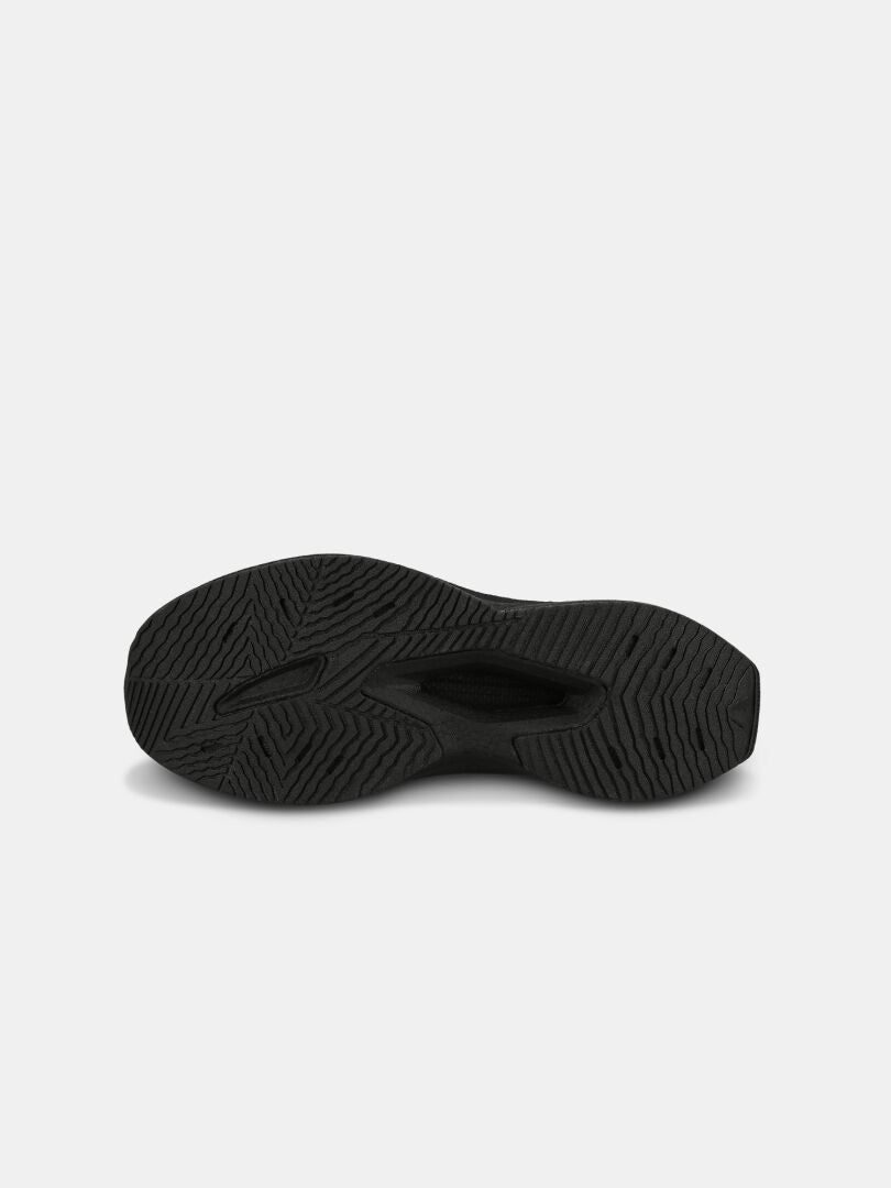 Black sole shown from below, with textured tread on a Halti Syke Sneaker Men's lightweight walking shoe.