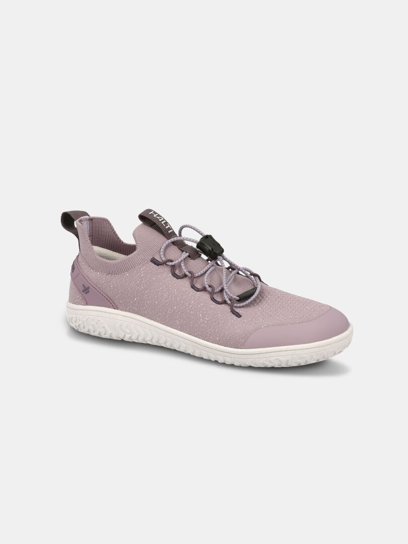 The Halti Vire Barefoot Shoe Women's is a light purple zero-drop shoe with white sole, elastic laces, and black toggle.