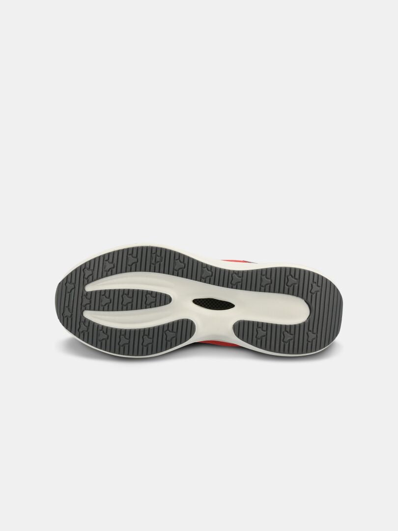 The Halti Frisk Sneaker Women's features a gray and white rubber outsole with a textured tread for breathability.