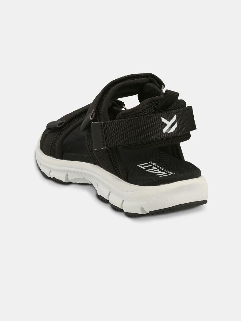 The Halti Resa 3 Sandal Women's in black and white, shown from the back with adjustable straps on a light gray background.