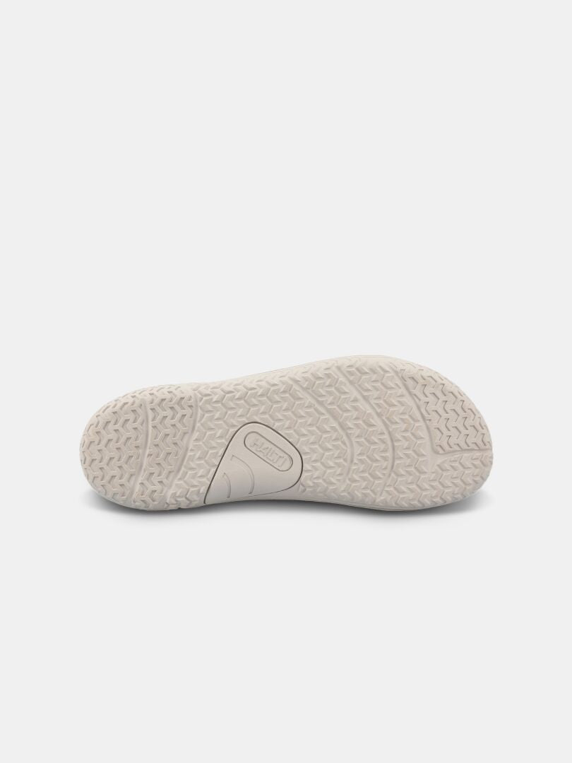 Bottom view of the Halti Vire Barefoot Shoe Men's sole with a light color and textured, patterned grip.