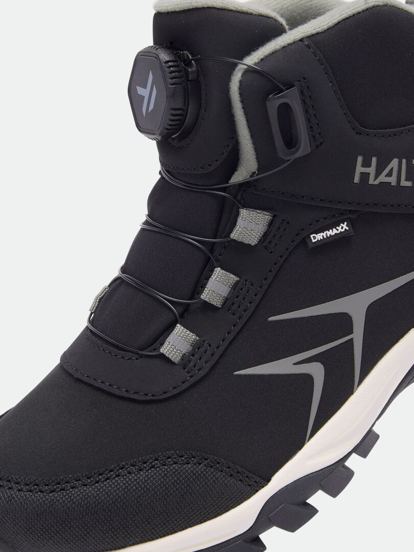 Black waterproof Halti Tribe Dada DX Outdoor Shoe for kids with a dial-based lacing system and a thick sole.