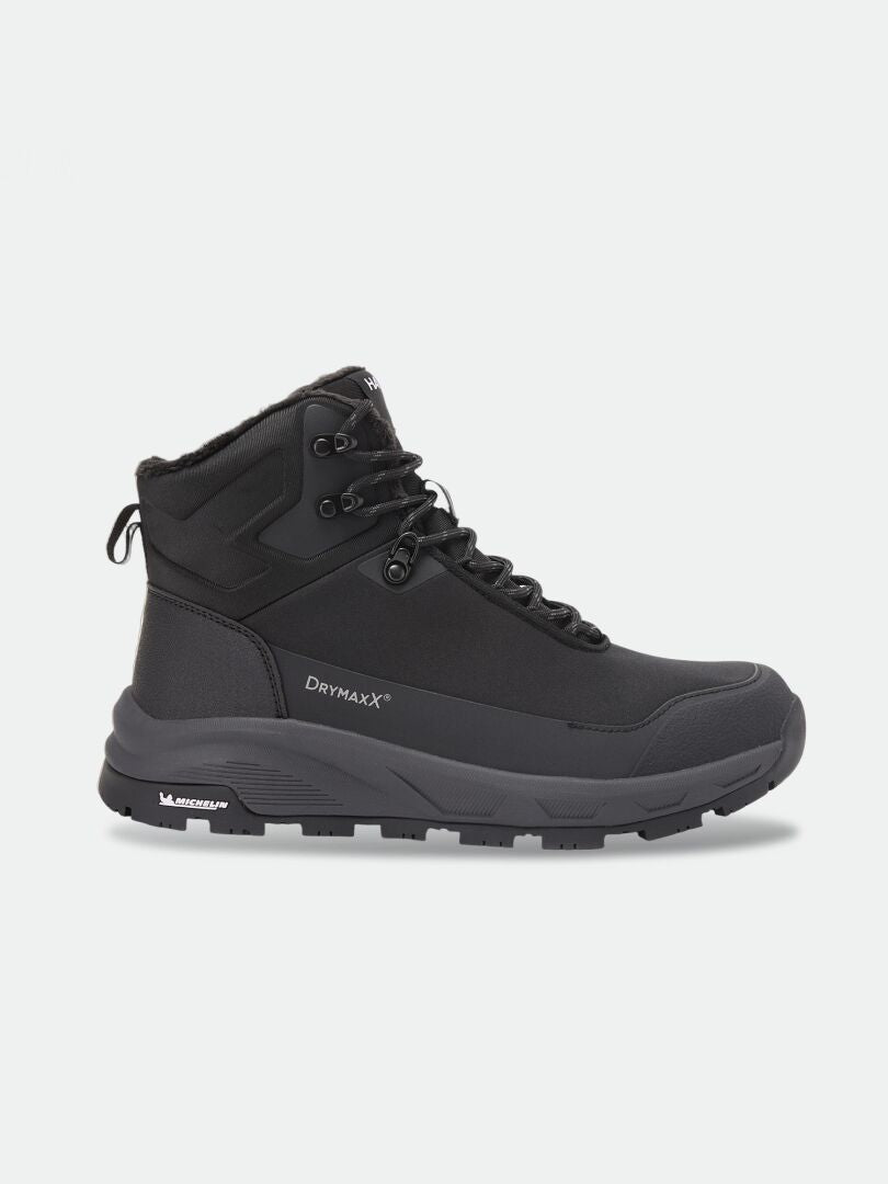 Black Halti Tunturi Mid DX IC Winter Shoe with a lace-up closure and a lugged Michelin Ice Control outsole.