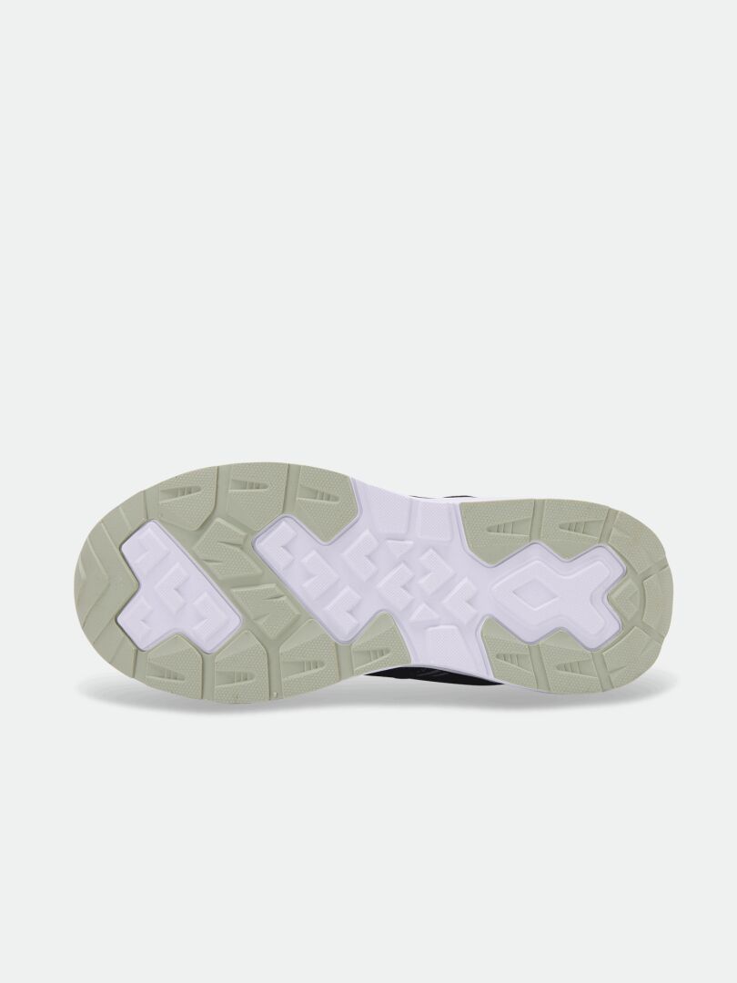 The bottom view of Halti Zuma Mid DX kids’ sneakers shows a beige and white sole on a light background.