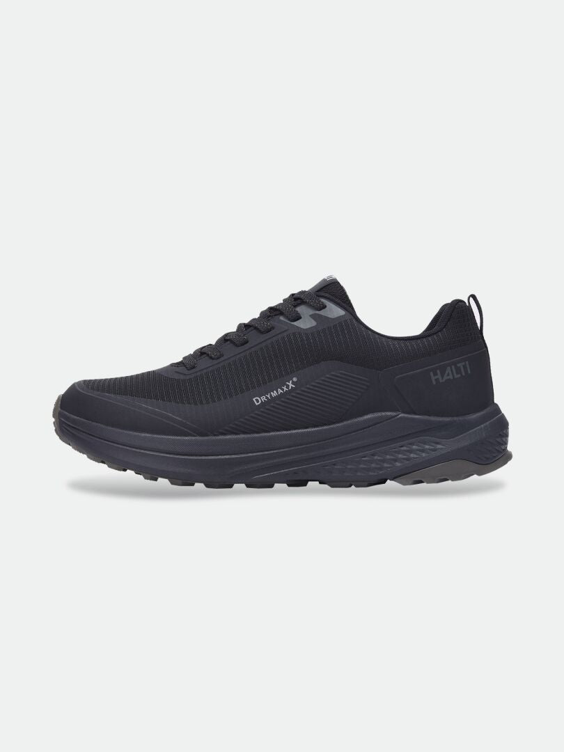 Halti Asento DX men’s outdoor shoe: black, textured sole, lace-up, natural fit for comfort.
