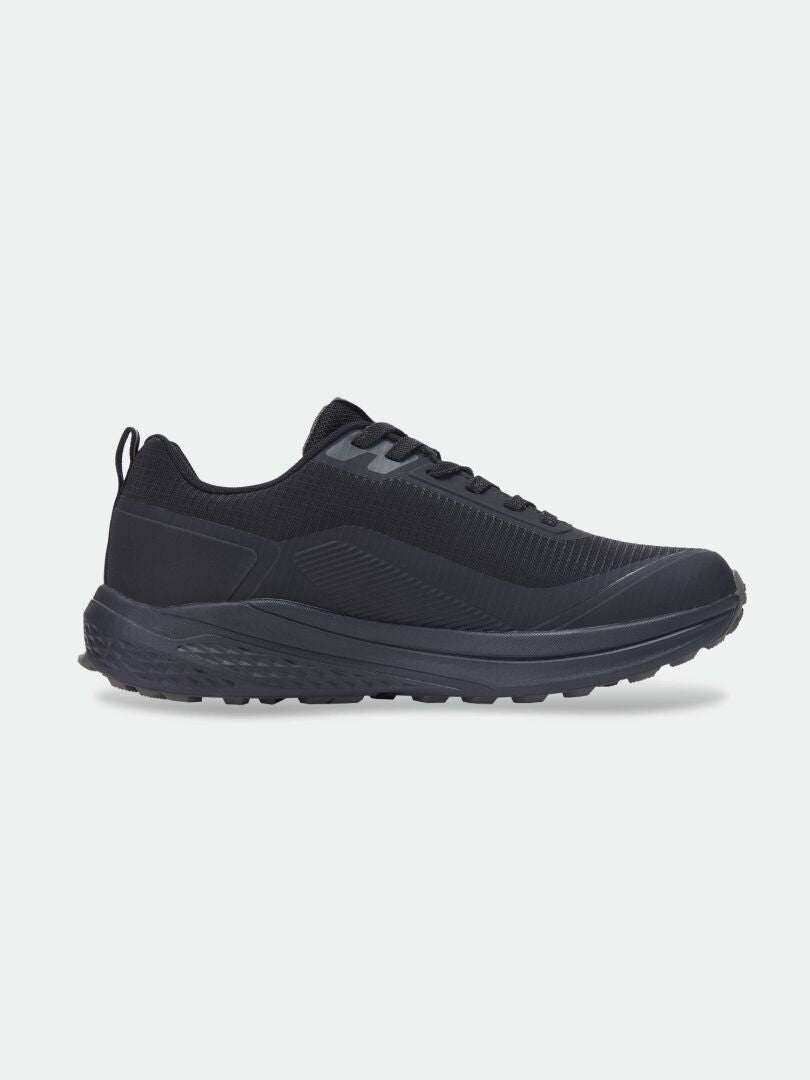 Halti Asento DX Men’s black mesh zero-drop sneaker with textured sole, shown side profile on white background.