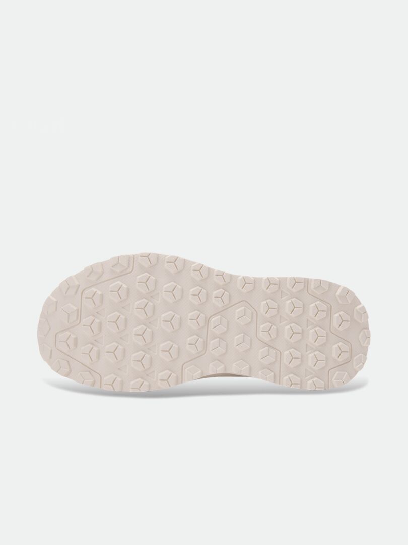 Light-colored sole of a Rest Winter Boots Women’s with a repeating geometric lug pattern for comfortable travel.