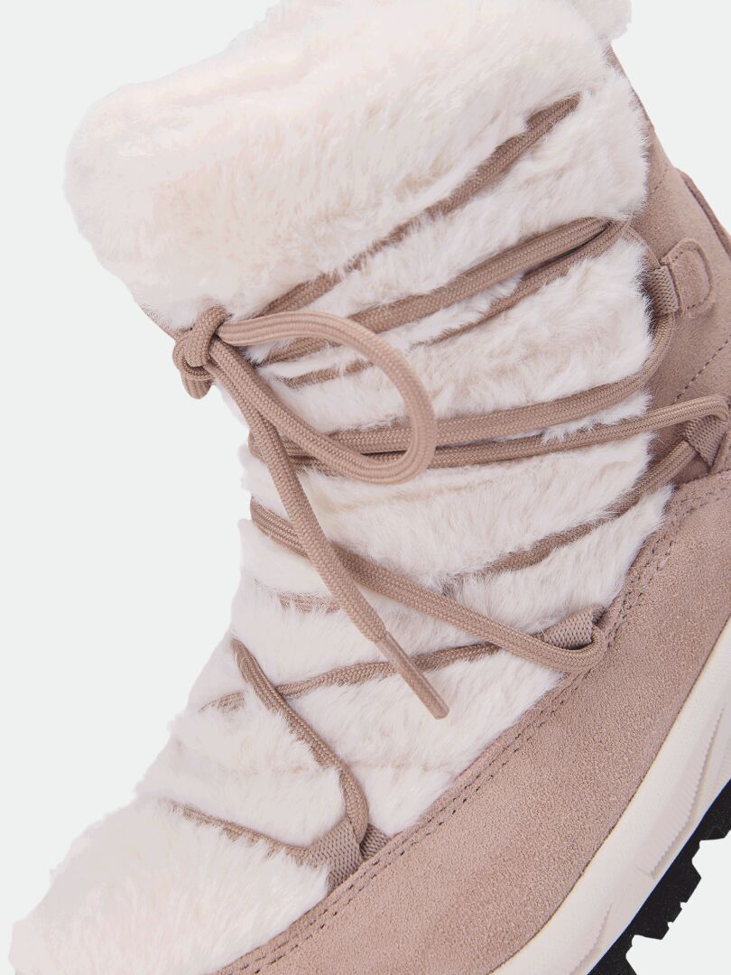 Close-up of beige, waterproof Halti Mukluk DX IC Winter Boots with a faux-fur shaft and lace-up front.
