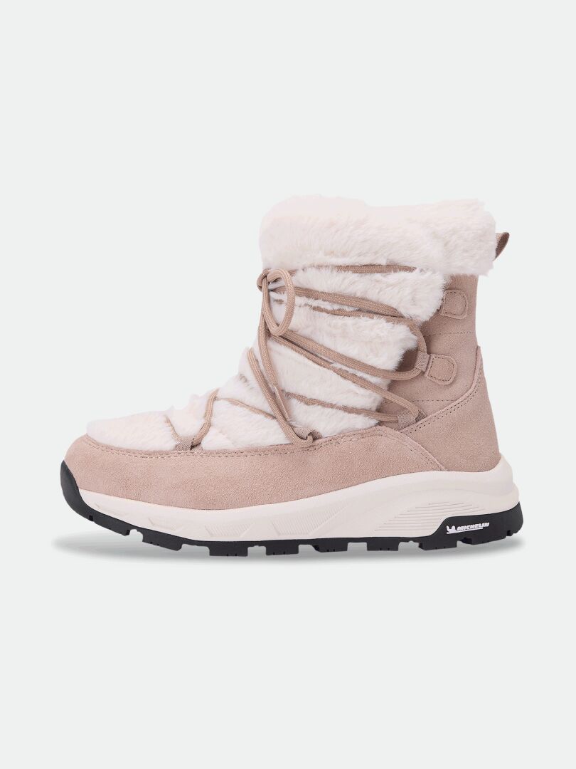 Beige waterproof Mukluk DX IC Winter Boots with white faux fur, tan suede accents, wraparound laces, and a lugged sole.