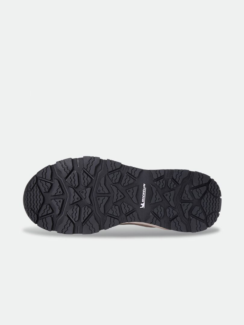 Black Mukluk DX IC Women’s winter boot sole with thick Thinsulate tread patterns and a center tire-brand logo.