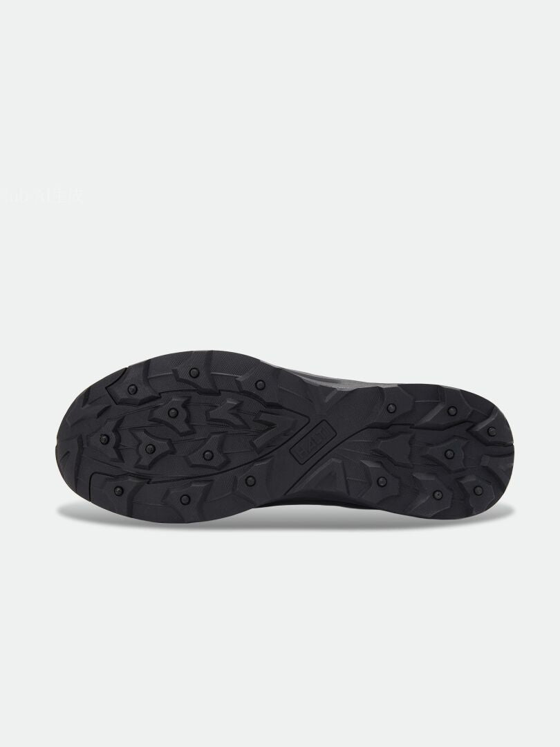 Black Lynx Mid 2 DX Freelock Spike Shoe Men’s outsole with a lugged tread pattern and embedded metal spikes.