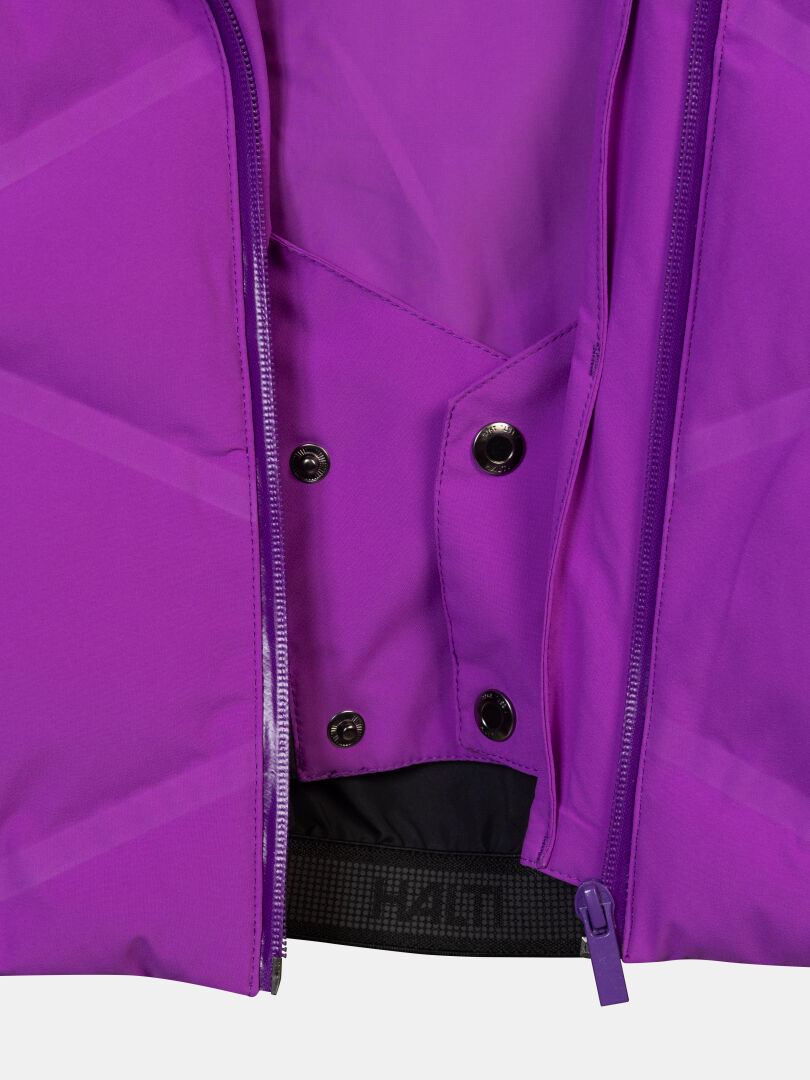 Close-up of Halti Nordic Arcty II Women’s Ski Jacket in purple with zipper, snap buttons, and inner elastic band.