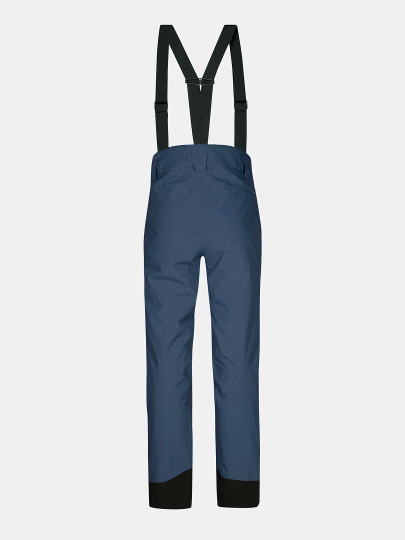 Halti Carvey II DX Women's blue waterproof ski pants with black suspenders and reinforced cuffs, back view on white.