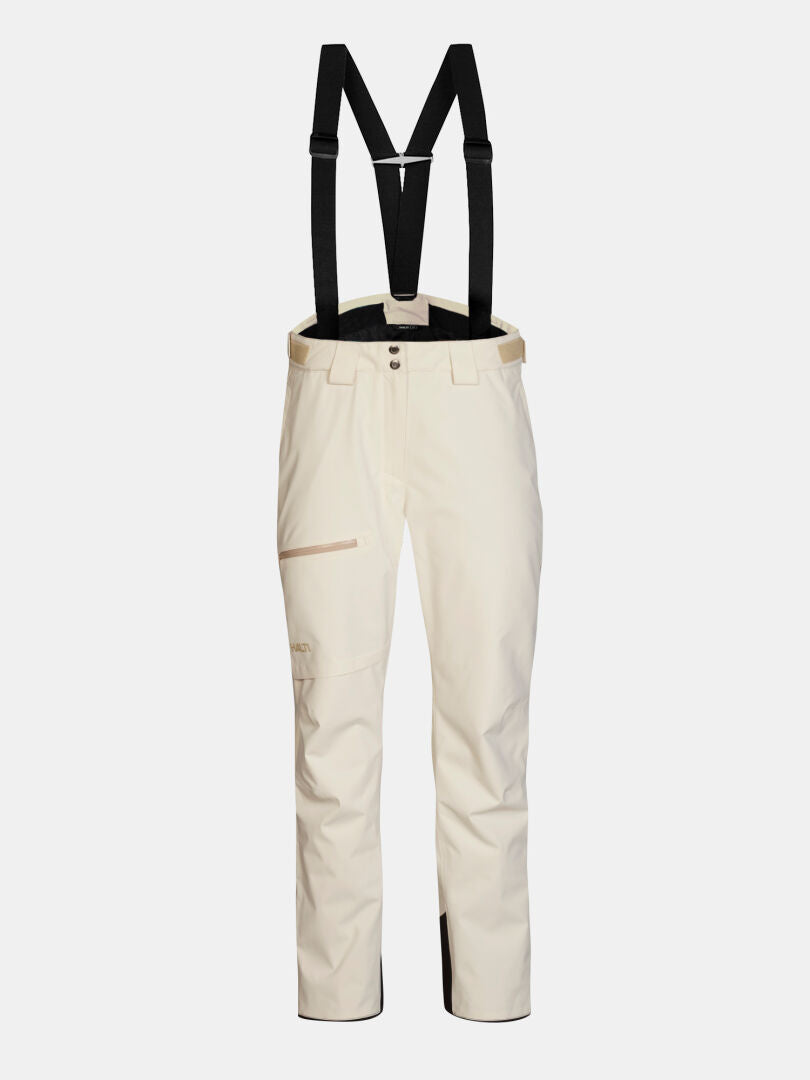 Cream-colored Halti Carvey II DX Ski Pants for women featuring black suspenders.