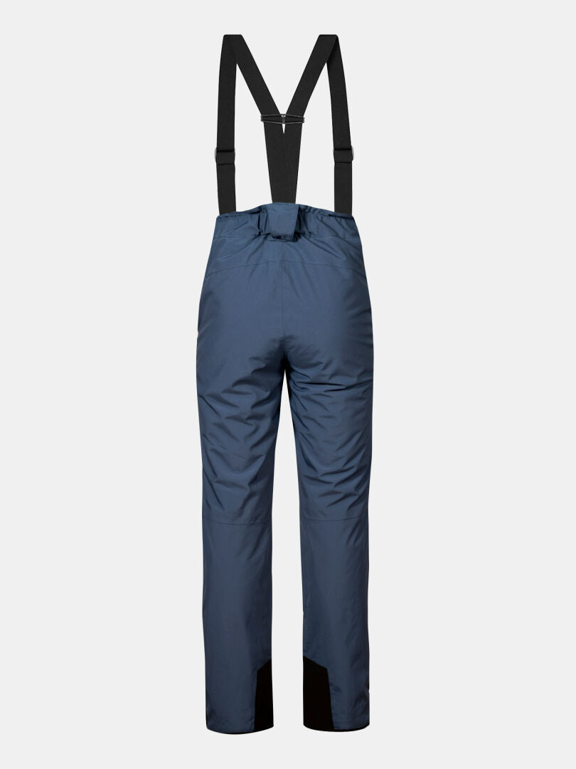 Halti Glades II DX Women's ski pants in blue with black suspenders and reinforced cuffs, shown on white background.