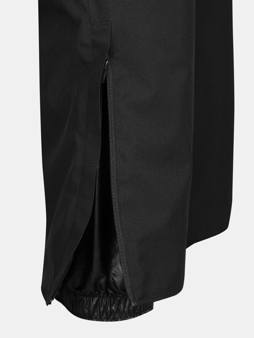 Close-up of Halti Glades II DX Men's black ski pants with side zipper and elastic cuff at the bottom.