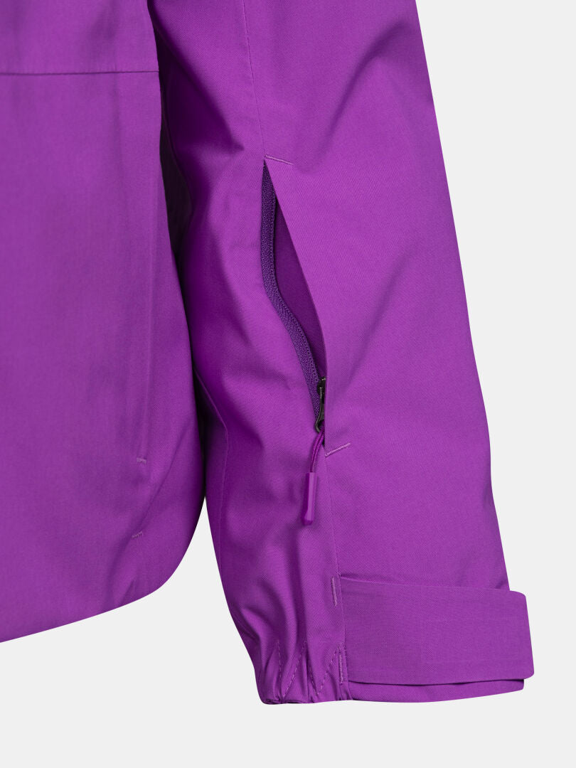 Close-up of a purple Melvik DX Ski Jacket Women’s sleeve featuring an underarm ventilation zipper.