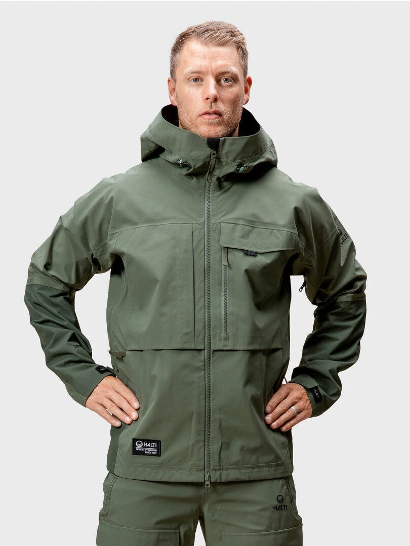 A man faces forward in a Halti Hiker DrymaxX 3L Ventilated Jacket against a plain background.