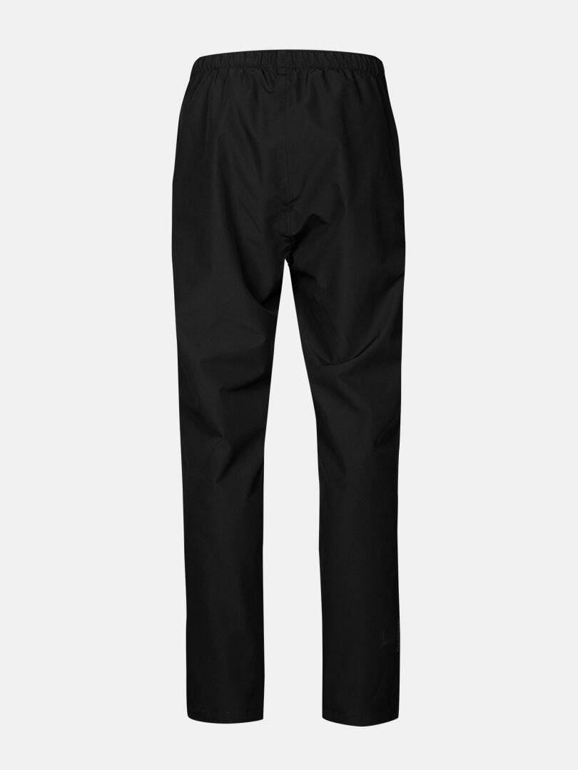 Halti Forter DrymaxX Shell Pants Men's in black, back view, with elastic waistband on light gray background.