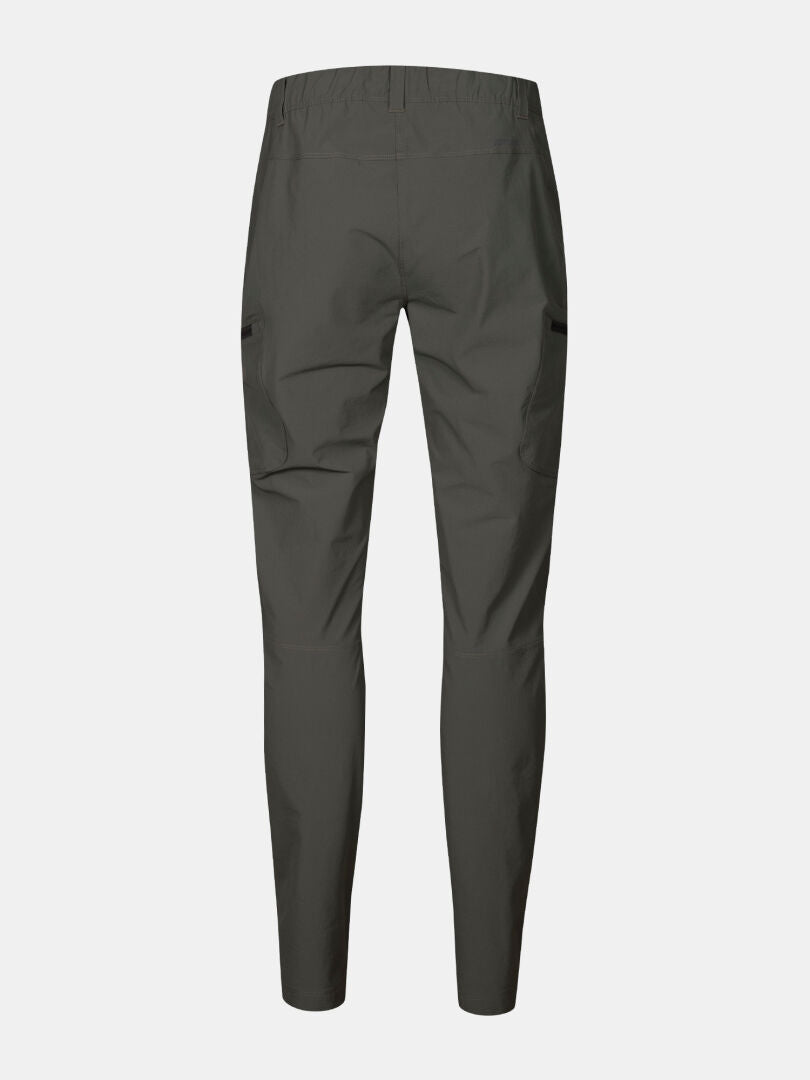 Back view of Halti Pallas Evo X-stretch Pants Women's in dark gray, featuring elastic waistband and side pockets.