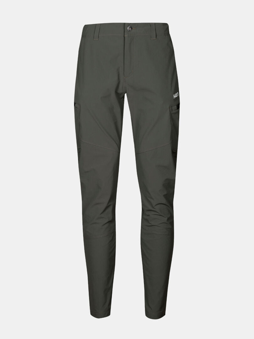 Halti Pallas Evo X-stretch slim-fit women’s pants in dark green with side pockets and button closure, shown on white.