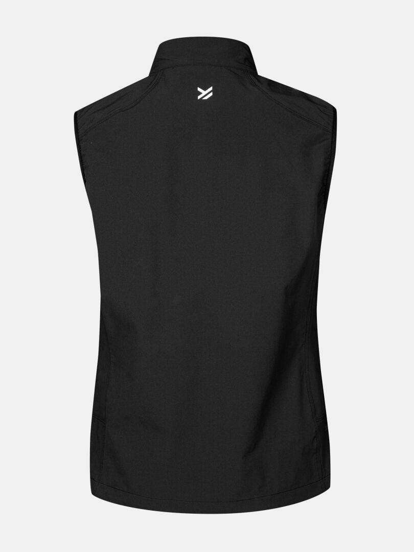 Back view of Halti Pallas Evo X-stretch Vest Women's with a small white logo by the collar on a light background.