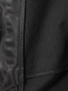 Close-up of Halti Pallas Evo Brushed X-stretch Jacket Womens fabric, highlighting black stitching and panel texture.