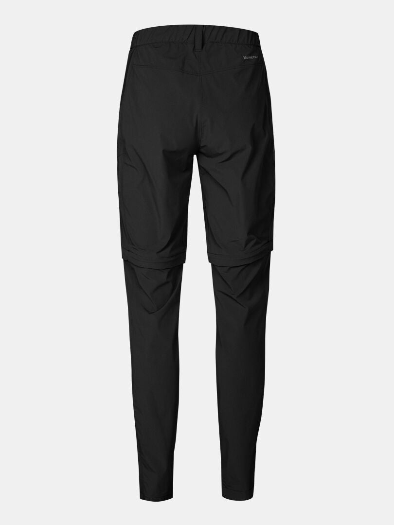 Halti Pallas Cool Stretch Zip-off Pants Women's, shown from the back, feature detachable legs and UPF 90+ for hiking.