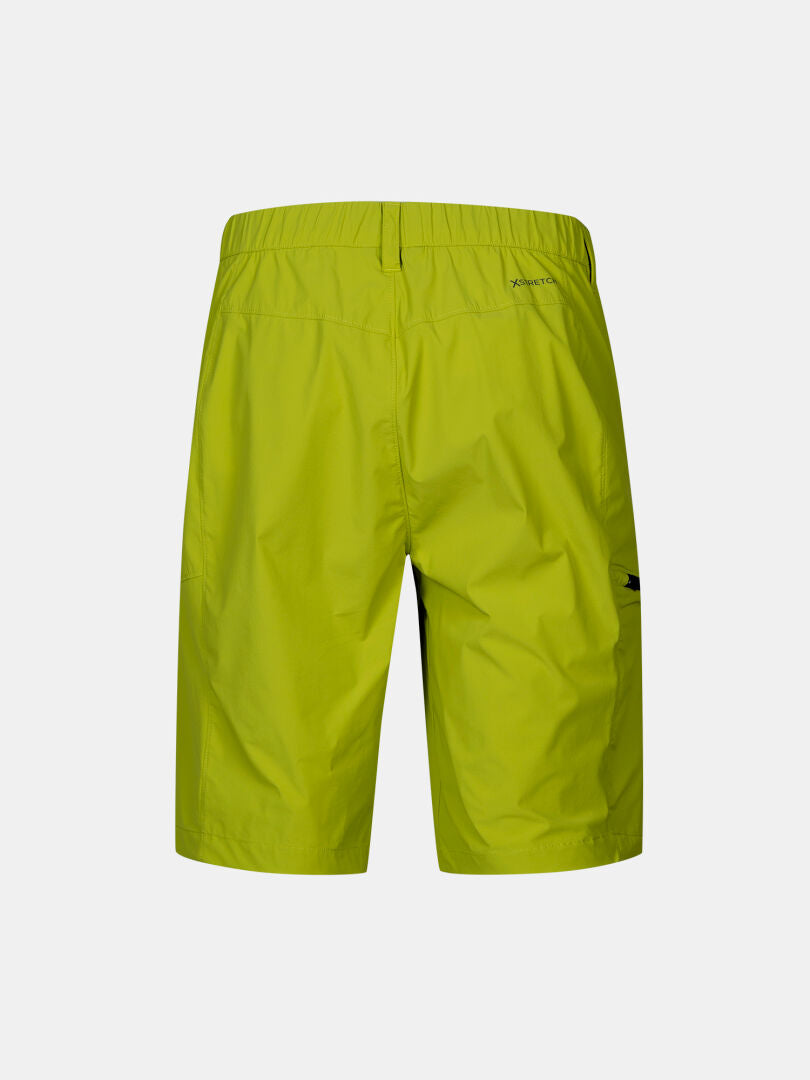 Back view of Halti Pallas Cool X-stretch Men's lime green shorts with elastic waist and small logo near the waistband.