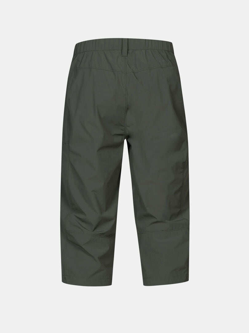 Back view of Halti Pallas Cool X-stretch Capri Pants Men's in olive green with elastic waist and UPF 90+, on white background.