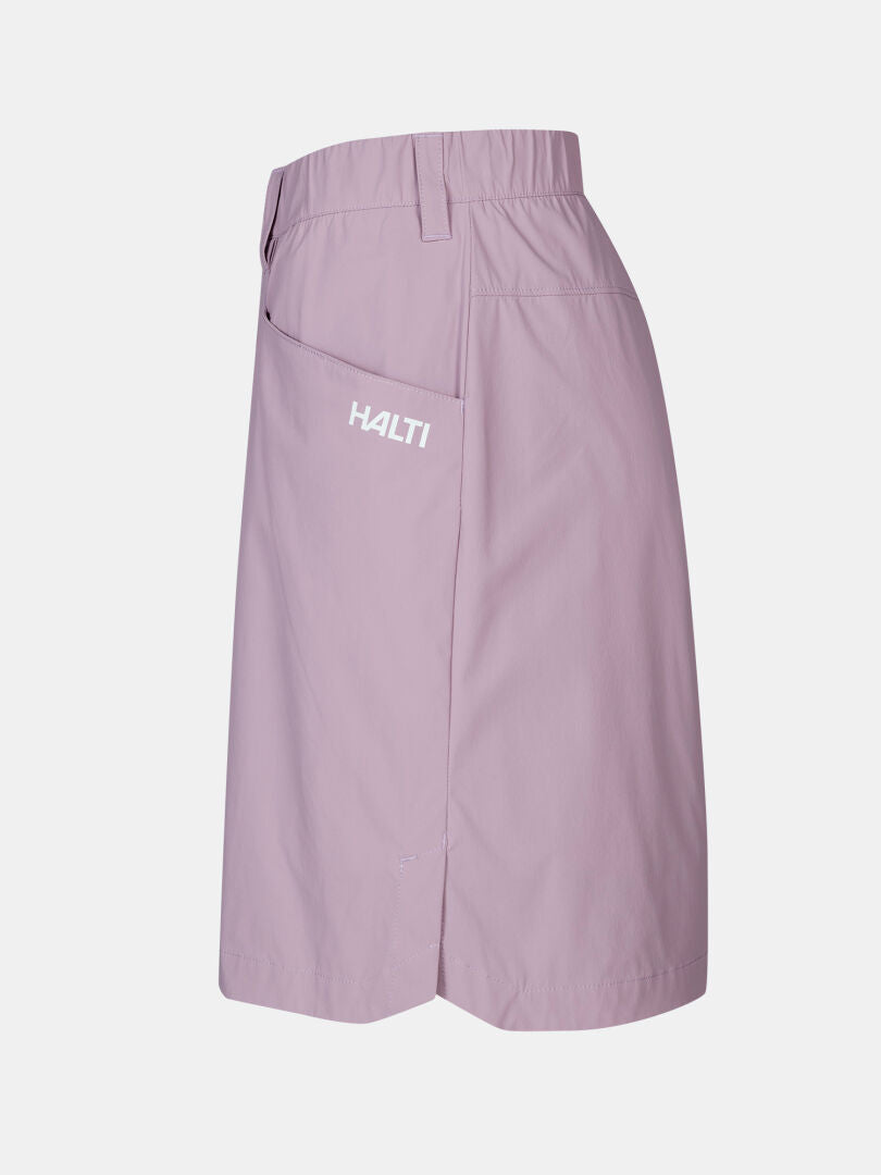 Halti Pallas Cool Skort Women's: Light purple, knee-length, quick-dry fabric, elastic waist, side pocket, white logo.