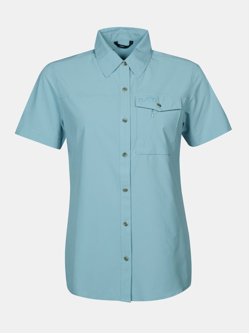 Halti Samoy Trekking Shirt Women's in light blue, short-sleeve, with collar, chest pocket, and quick-dry fabric.