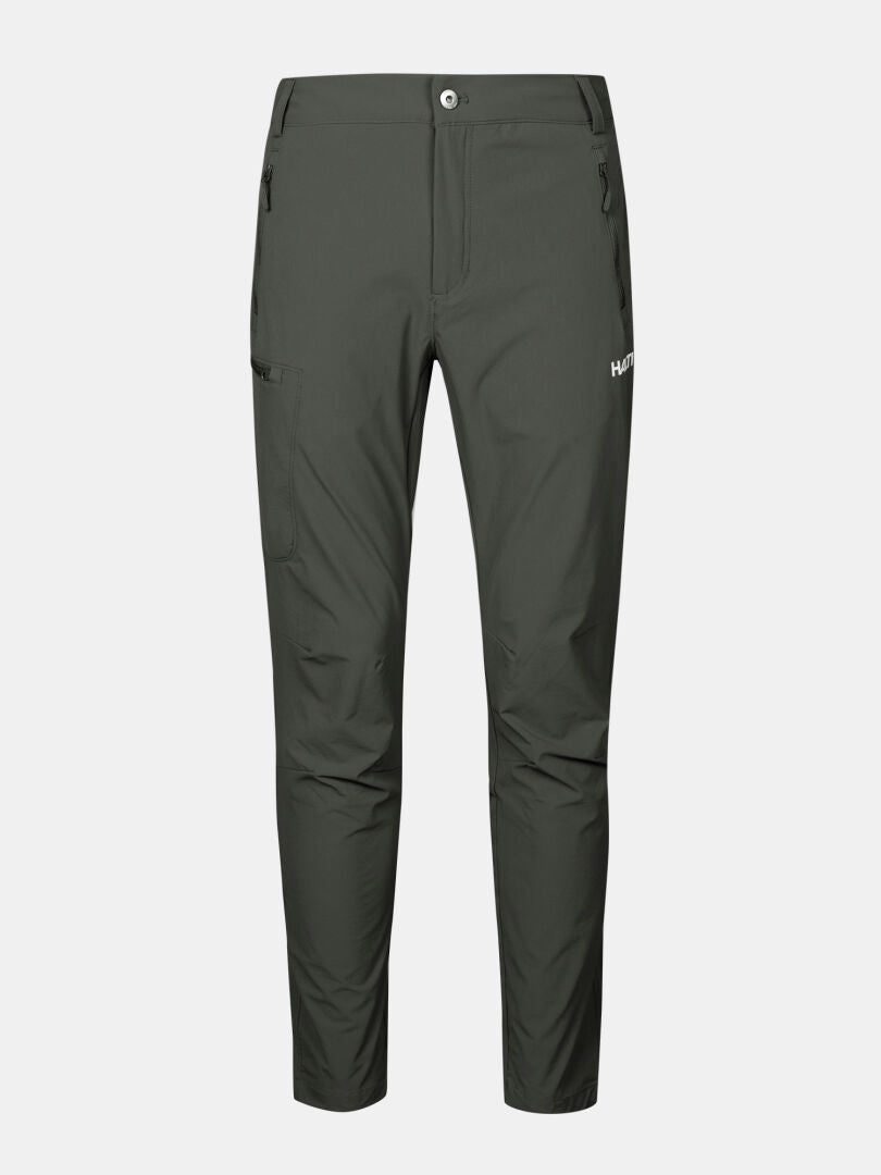 Halti Pallas X-stretch Men's pants: dark green, slim-fit, quick-dry, durable, with two zippered side pockets.