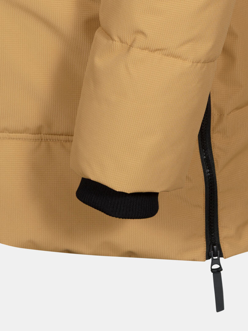 Close-up of the Halti Linjat Parka Jacket Men's tan sleeve with black cuff and side black zipper.