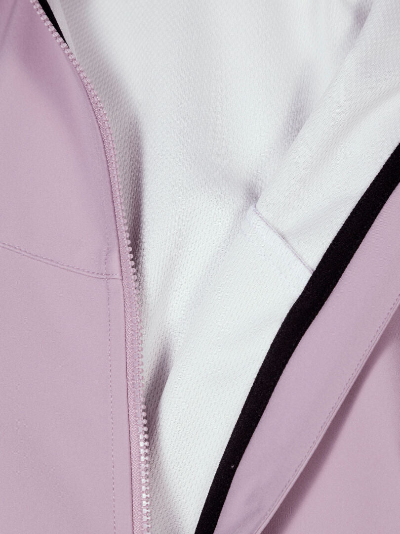 Close-up of the Halti Wedge Softshell Jacket Women's with zipper, white textured lining, and black trim.