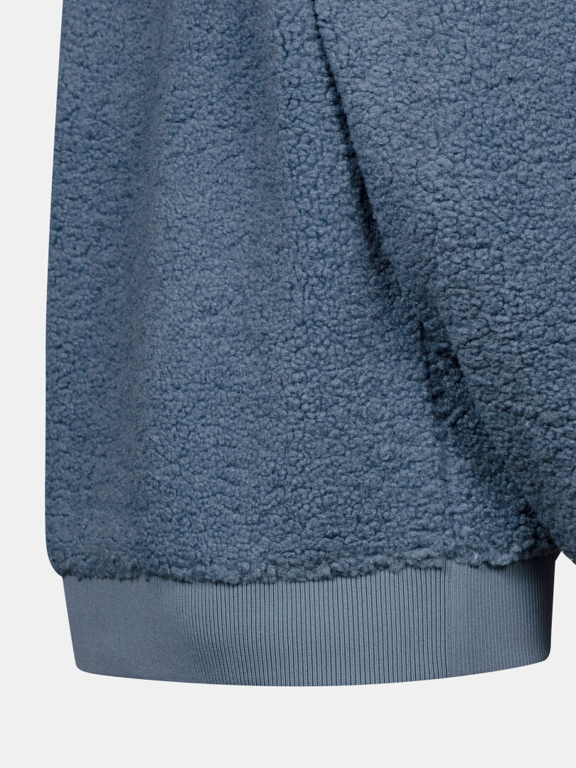 Close-up of the Halti Lykky Fleece Jacket for women, featuring a relaxed fit and soft, shearling-inspired texture.