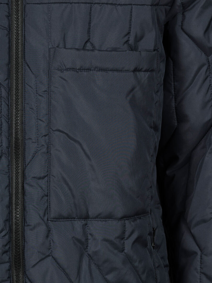 Close-up of Halti Synkas II 3in1 DX Parka Men's with dark quilting, chest pocket, and zipper on the waterproof shell.