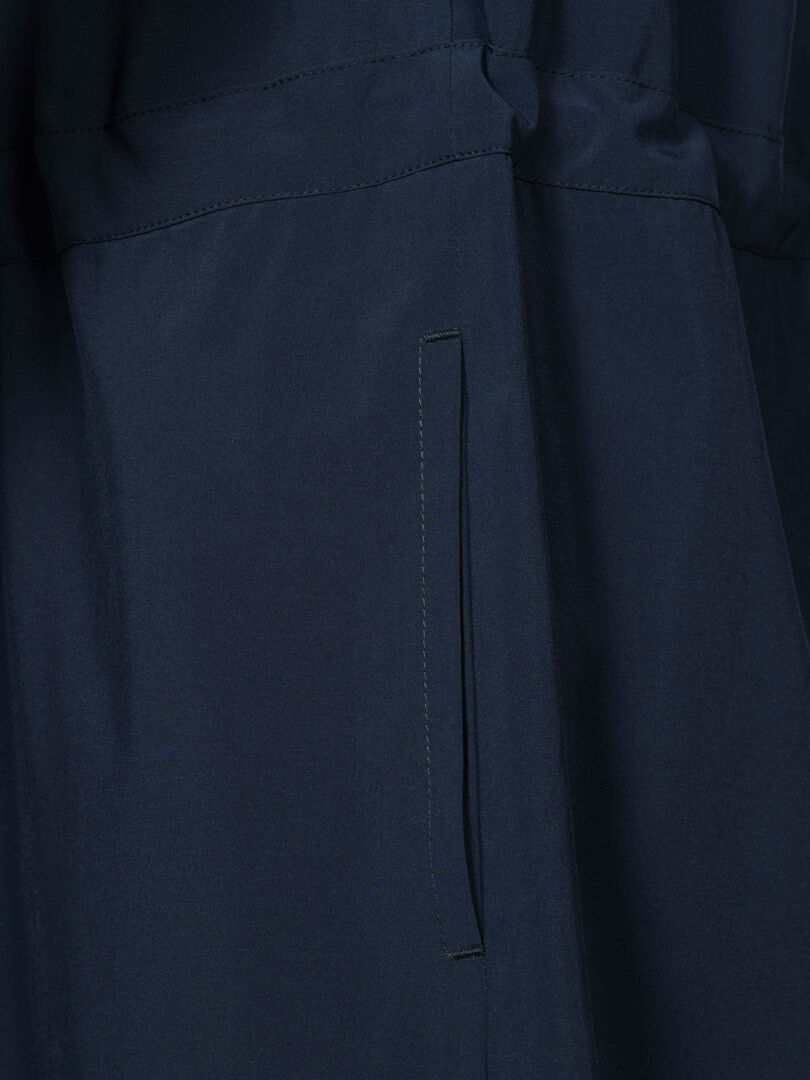 Close-up of Halti Chipper II X-stretch Dress Women's in dark blue with quick-dry stretch fabric and vertical slit pocket.