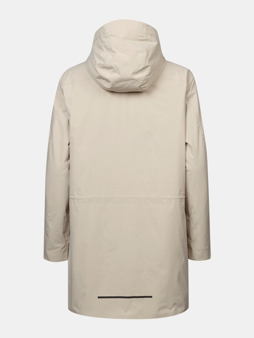 Halti Kortteli DX Insulated Parka Women’s in light beige, hooded, shown from the back on a white background.