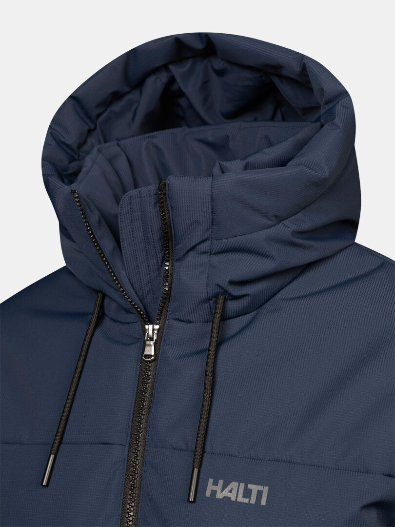 Close-up of Halti Kaimoa Insulated Jacket Men’s in navy, showing zippered front, hood, and black drawstrings.