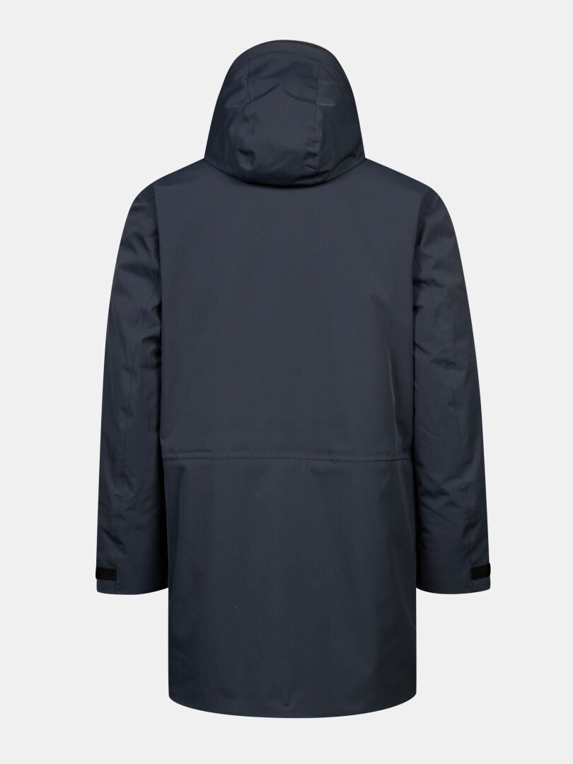 The Halti Kallio DX Parka Men’s in dark blue is shown from the back, featuring long sleeves and a straight hem.