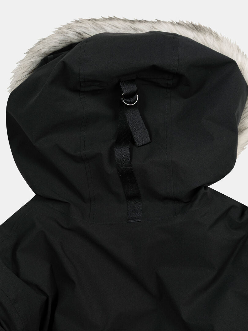 Close-up of Halti 1976 Down Parka Unisex in black with faux fur trim and adjustable back hood strap.
