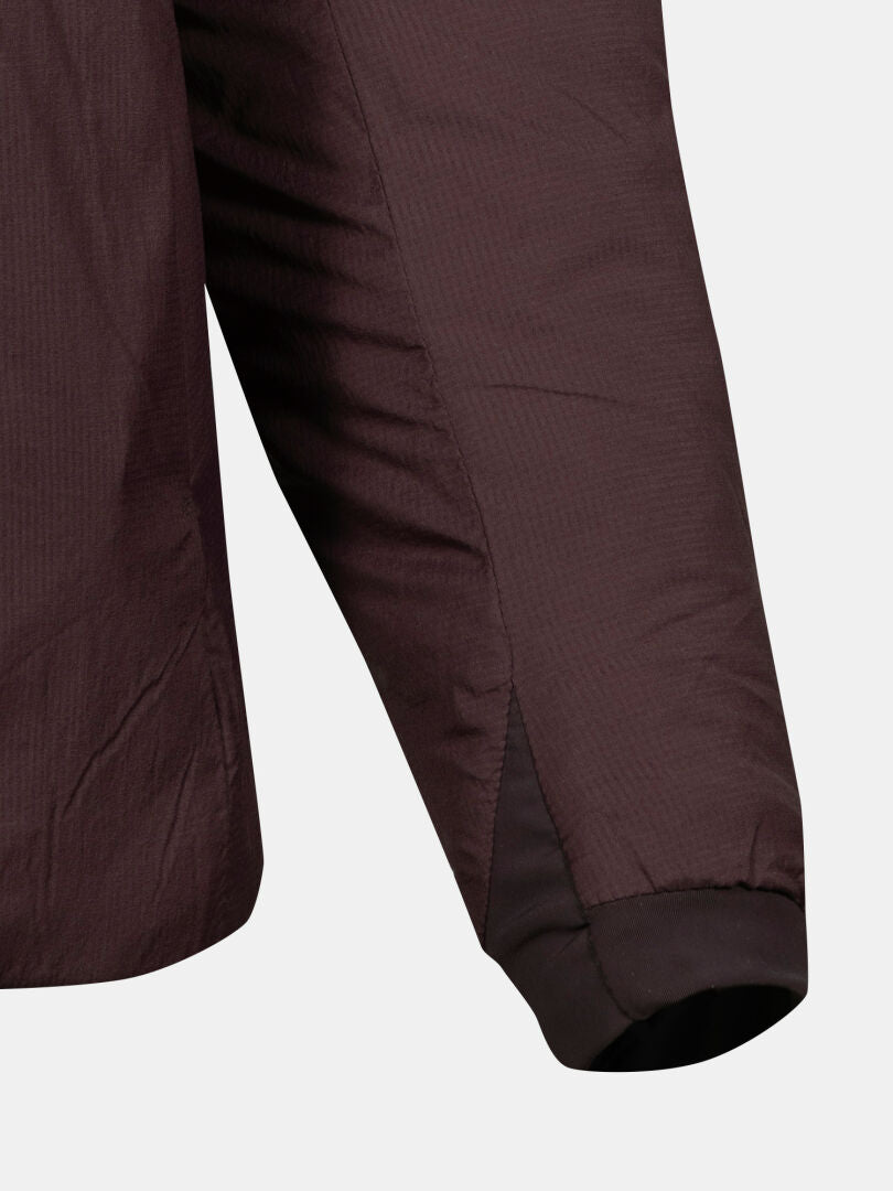 Close-up of the sleeve and side seam on the Halti Haave PrimaLoft Insulation Jacket Women's, showing cuff and side slit.