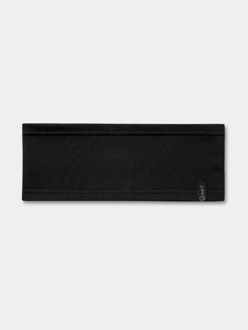 The Halti Loiva Headband is flat, black, recycled polyester with a small black tag, shown on a light gray background.